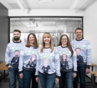 Shellblazers wearing caricature Christmas sweaters
